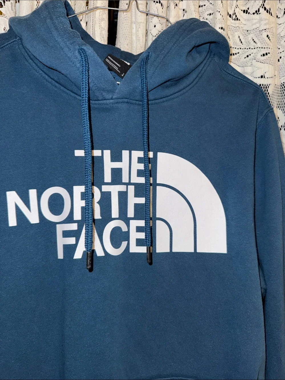 The North Face Blue Hoodie with White Logo
